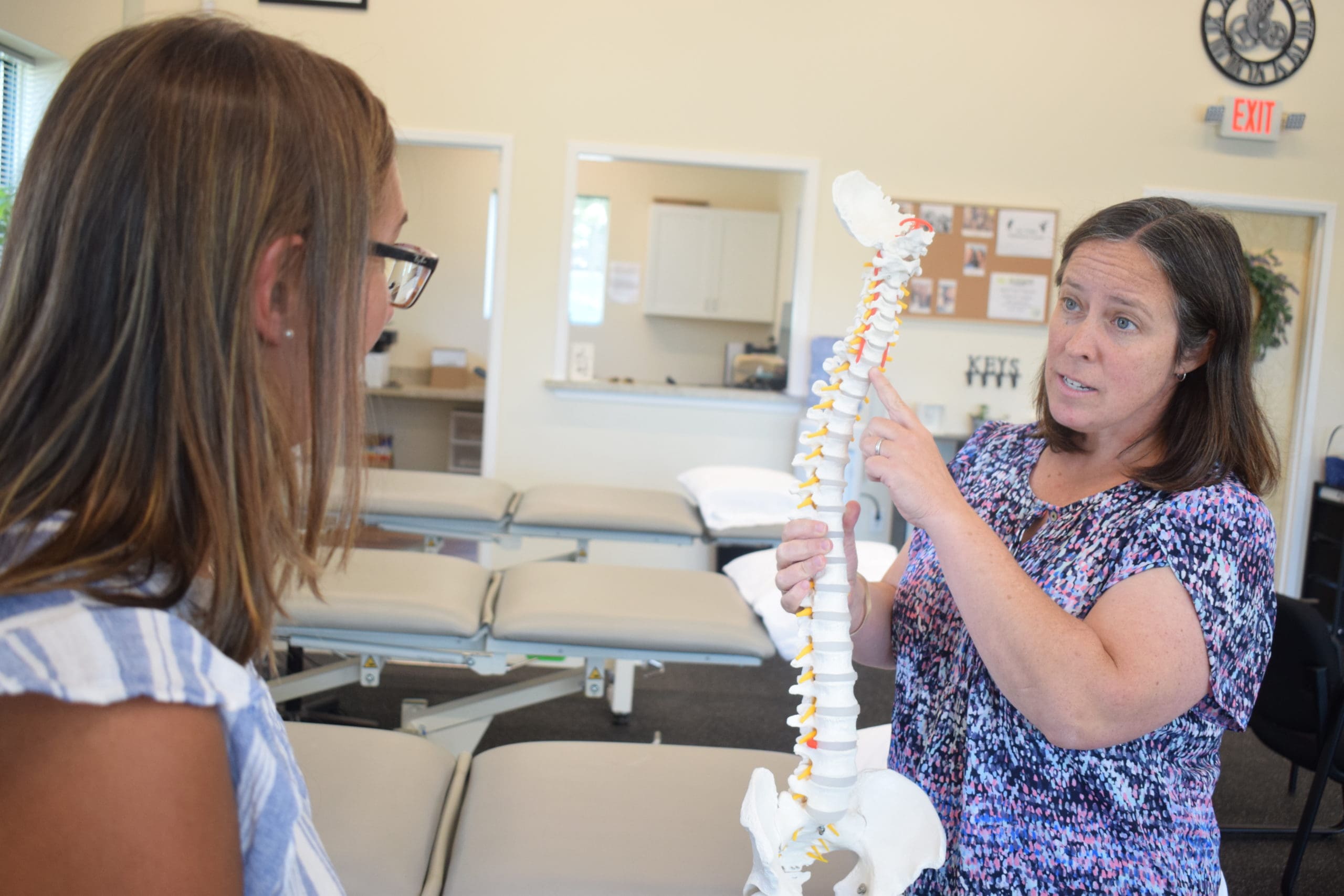 Physical Therapist explaining to patient